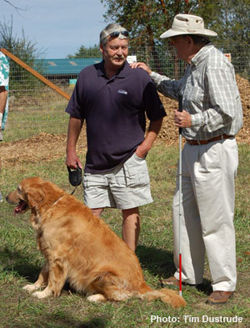 People A man and dog at the dog park